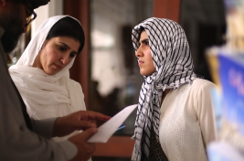 Shamsul teaching Maria and Ayesha